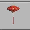 Red Chinese Lantern with Golden Floral Patterns Hanging from Black Pole with Red Tassel
