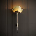 Elegant Petal Shaped Wall Lamp With Golden Stand On Dark Vertical Striped Wall Warm Light