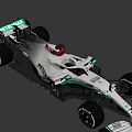 Silver And Green Formula 1 Racing Car With PETRONAS Logo And Streamlined Body Design
