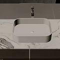Elegant White Washbasin on Marble Countertop with Modern Chrome Faucet Design