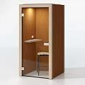Brown Soundproof Booth Interior With Glass Door Small Desk And Stool