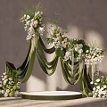 Elegant Wedding Decoration With Green Drapery Arch White Flowers And Floral Platform