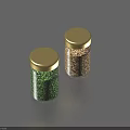 Two Spice Jars With Green And Gold Contents And Golden Lids On Blue Background