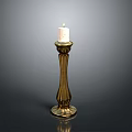 Elegant Golden Candlestick With Lit Candle And Slender Decorative Design