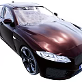 Dark Brown Jaguar Car With Sleek Body Distinctive Grille Sharp Headlights And Black Alloy Wheels