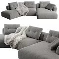 Modern Gray Sectional Sofa with Soft Cushions and Cozy Throw Blanket