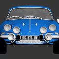 Blue Vintage Sports Car With Sleek Design Silver Wheels And Reflective Surface