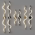 Modern Spiral Design Wall Lamps with Gold and Black Finish Illuminated in Gray Background