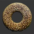 Golden Shiny Seed Covered Bagel with Sesame and Poppy Seeds on Dark Background