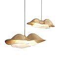 Two Golden Curved Pendant Lights Illuminated In Modern Interior With Gray Background