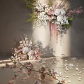 Elegant Floral Arrangement With Pink White Flowers Green Foliage And Scattered Petals
