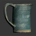 Handcrafted Turquoise Ceramic Cup With Textured Surface And Unique Design On Dark Background