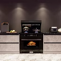 Modern Kitchen With Black Stove Range Hood Toaster And Countertop Appliances