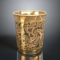 Artistic Golden Cup Featuring Intricate Floral Carvings And Detailed Sculptural Design
