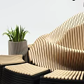 Casual Sofa Set With Wave Design Beige And Black Seats Green Plants In Bright Room