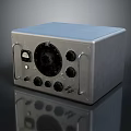 Vintage Electronic Device with Square Gray Metal Casing Control Knobs and Ports