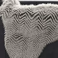 Stylish Black Leather Accent Chair with Tufted Back White Fur Throw and Wooden Legs