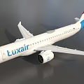 Luxair Airplane With White Body Red And Blue Tail Wings And Engine