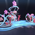 Decorative Art Installations With Pink Flowers Butterflies And Blue Curved Structures On Lit Platform