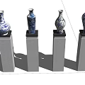 Ceramic Vases in Blue and White Design on White Pedestals with Gold Vertical Striped Wall