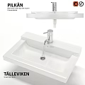 Modern White Washbasin with Chrome Faucet and Sleek Countertop Design