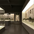 Well Lit Museum Exhibition Hall With Glass Display Cases Bronze Artifacts And Wall Descriptions