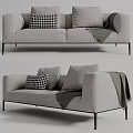 Light Grey Two Seater Sofa With Black Checkered Pillow Green Throw Blanket Black Metal Legs