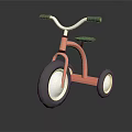 Orange Children's Tricycle With White Wheels Black Handlebars And Seat