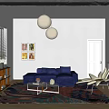 Living Room With Blue Sofa Colorful Area Rug And White Spherical Pendant Lights