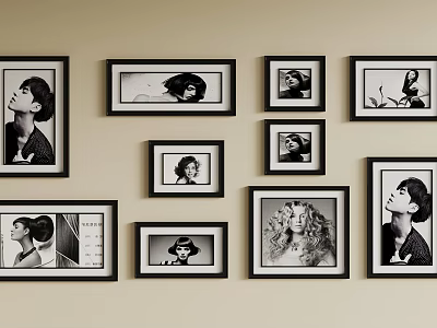 Stylish Photo Wall With Multiple Black And White Portrait Frames On Beige Wall 3d model
