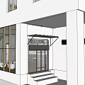 Modern White Storefront Exterior With Large Glass Windows Columns Entrance Steps And Awning
