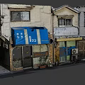 Old Traditional Storefront Buildings Featuring Blue Awning Windows Doors Japanese Signage and Plants