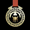Golden Medal Art Installation Featuring Intricate Patterns And Cauldron Design With Red Ribbon