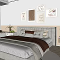 Modern Bedroom Interior With Beige Bed Round Rug Ceiling Fan And Artworks