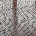 Elegant Herringbone Pattern Wooden Floor With Natural Warm Texture Design