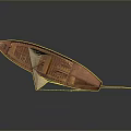 Wooden Sailboat Model With Cloth Sail And Wooden Hull On Dark Background