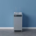 Floor Standing Stainless Steel Water Dispenser With Dual Taps And Display Against Blue Wall