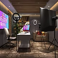 Modern Public Office Space With Large Screen Computer Chair Green Plant Sofa And Tripod Equipment