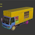 Daily Living Essentials Transported By Yellow Box Truck With Blue Cab And Wooden Sections