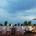 Outdoor Terrace Restaurant With Tables Chairs Green Plants Umbrella Water Feature And Night View