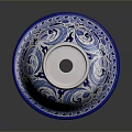 Blue and White Ceramic Sculpture Carving With Intricate Floral Patterns And Bowl Shape