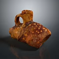 Hand Carved Ceramic Sculpture With Speckled Brown Texture And Vintage Handle Design