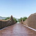Modern Wooden Bridge With Wavy Railings Over River And Natural Landscape