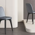 Minimalist Gray Upholstered Single Chair With Black Legs In Modern Interior