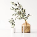 Large Amber Glass Vase with Olive Branches and Small White Ceramic Pot on White Background
