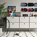 Modern Headphones Speakers With Vinyl Records Display On White Cabinet In Living Room With Plant
