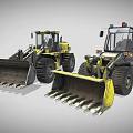 Two Yellow Construction Loaders With Large Buckets And Heavy Duty Tires