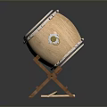 Brass Musical Drum With White Drumhead On Wooden Stand And Emblem