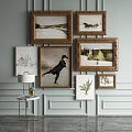Artistic Wall Decor with Various Framed Paintings and Side Table Lamp 3d model