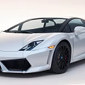 Silver Sports Car With Black Alloy Wheels Sleek Body Design And Modern Headlights
